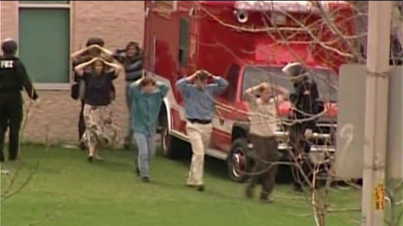 Students evacuated from Columbine H.S. after shootings. April 20, 1999