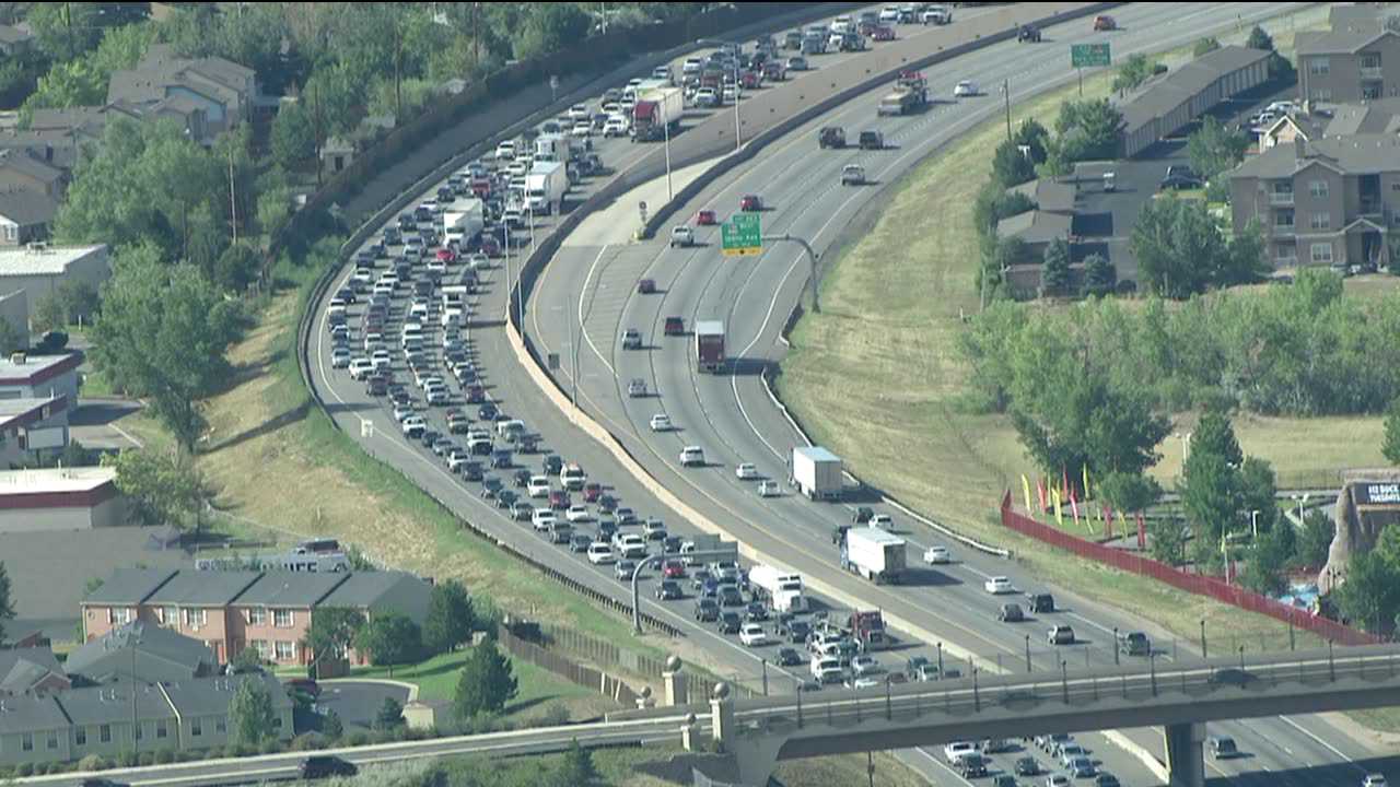 Traffic backed up for miles on SB I-25 after trucks damaed bridge. July 17, 2012