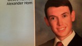 Suspect James Holmes, in a San Diego high school yearbook photo