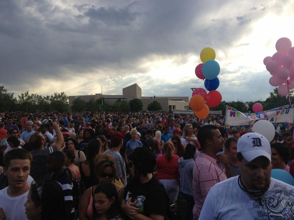 Crowds gather at the Aurora memorial vigil.