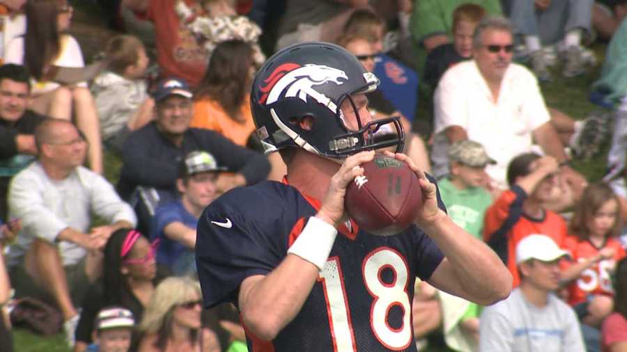 Peyton Manning throws at last public practice. Aug. 16, 2012