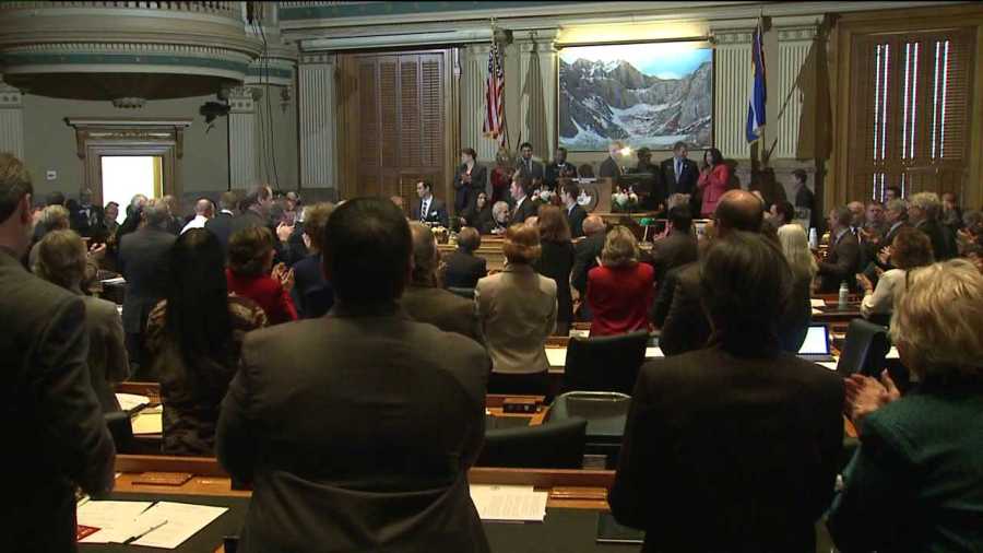 The Capitol applauds Gov. John Hickenlooper's State of the State address on Jan. 10, 2013.