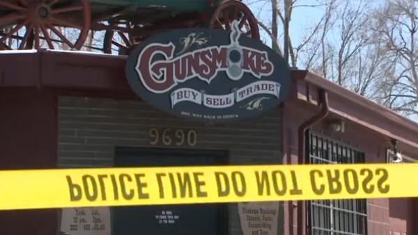 Police investigate at the scene of a burglary at the Gunsmoke gun shop in Wheat Ridge on Feb. 27, 2013.