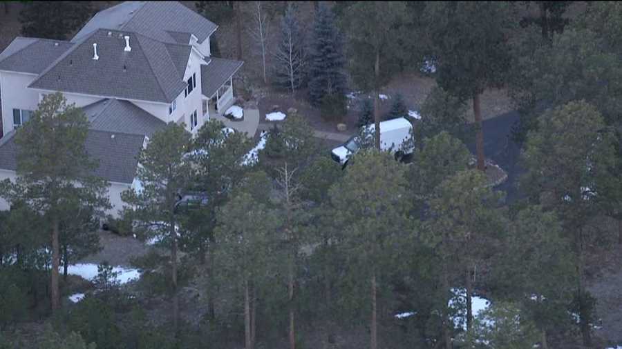 Police investigate outside the home of Colorado Department of Corrections Executive Director Tom Clements, who was shot and killed answering his door on March 19, 2013.