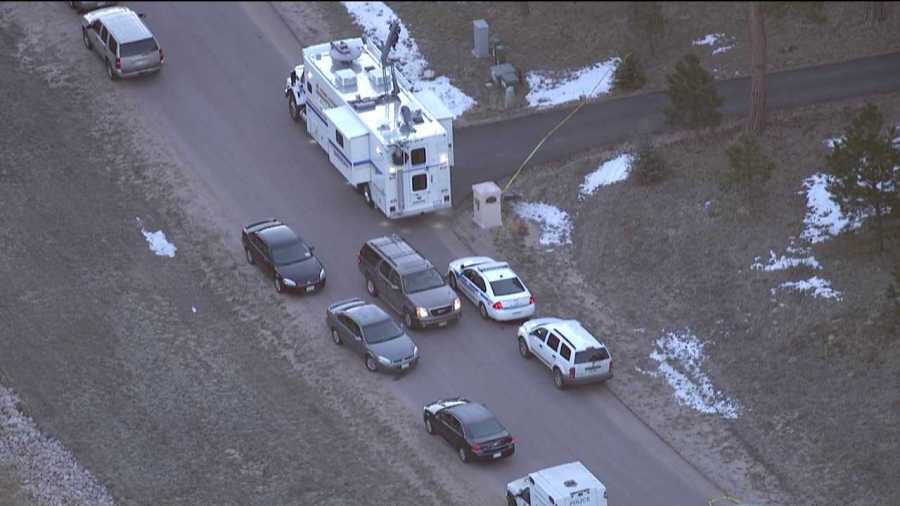 The El Paso County Sheriff's Office sets up a mobile command post near the home of Colorado Department of Corrections Executive Director Tom Clements, who was found murdered on March 19, 2013.