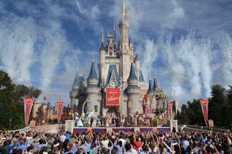 Disney World patrons watch the grand opening ceremony of the new Fantasyland expansion on December 6, 2012. (Credit: CNN)