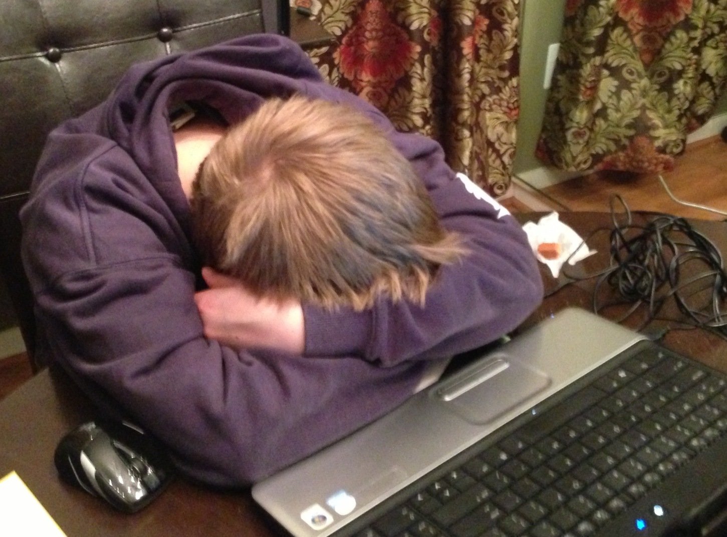 Deborah Zupancic shared a photo of her son, a high school junior, who fell asleep at the dining room table while doing his homework. She says: "Communication between parent and teen is crucial. These kids need to be taught how to navigate through stressful situations, so they bring these tools into adulthood."