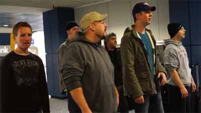 'Face' from Colo. entertains stranded travelers at Dallas Airport. Vocal band was stranded during ice storm.