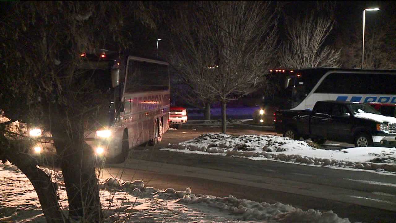 Buses carrying the Denver Broncos return to Dove Valley