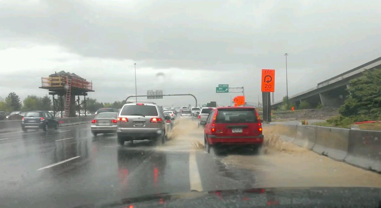 High water and slow traffic on I-25 at 6th Ave. in Denver. Photo: David Montes