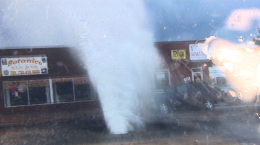 Cell phone image of water main break at Jamaica and Colfax in Aurora, Colo.