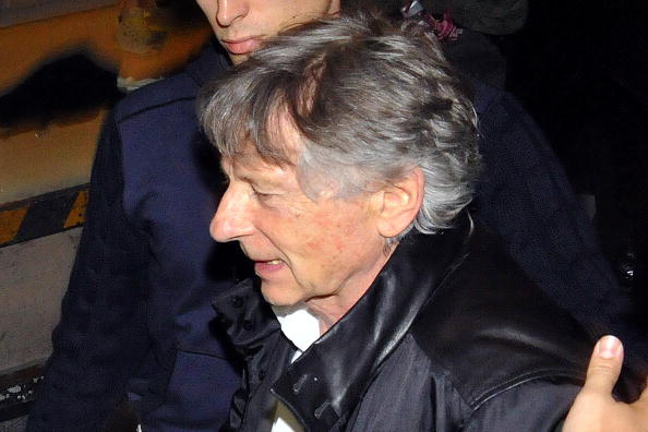 Film director Roman Polanski arrives at the Montreux Jazz Festival on July 17, 2010 in Montreux. Polanski, freed this week after Switzerland refused a US extradition request, said today he felt warm affection for the country despite his arrest last year. The 76-year-old director, who will make his first public appearance since his release to see his wife Emmanuelle Seigner perform at the Montreaux Jazz Festival today, made his remarks in an interview with Swiss television to be broadcast Saturday night. AFP PHOTO/STR (Photo credit should read STR/AFP/Getty Images)