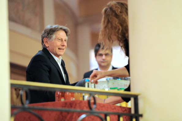 Film director Roman Polanski attends the 2011 Scopus Award gala at the Champs-Elysees Theatre on January 23, 2011 in Paris. French and Armenian-born singer Charles Aznavour won the Prize and all the profits of the evening will finance the "Edmond and Lily Safra" research laboratory in Jerusalem, dedicated to Parkinson disease. AFP PHOTO MIGUEL MEDINA (Photo credit should read MIGUEL MEDINA/AFP/Getty Images)