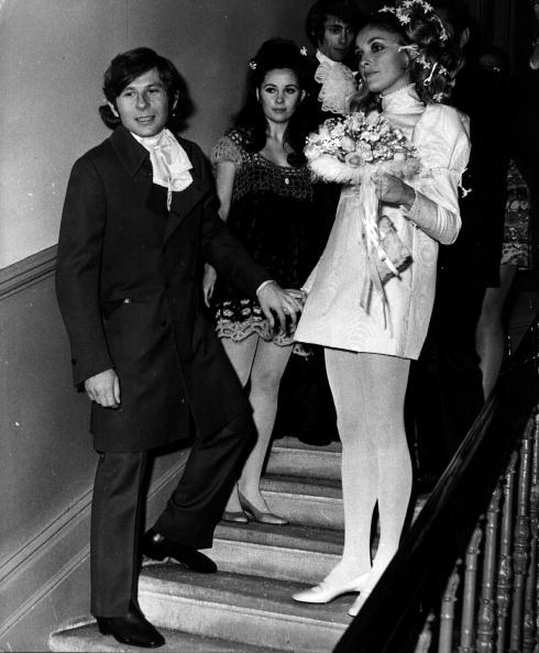 American film actress Sharon Tate (1943 - 1969) (right) with Polish film director Roman Polanski, after their wedding in London. (Photo by Keystone/Getty Images)