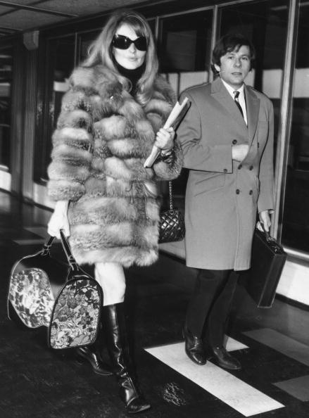 January 1967: Polish filmmaker and actor Roman Polanski with his second wife-to-be Sharon Tate (1943 - 1969) at London Airport. (Photo by Evening Standard/Getty Images)