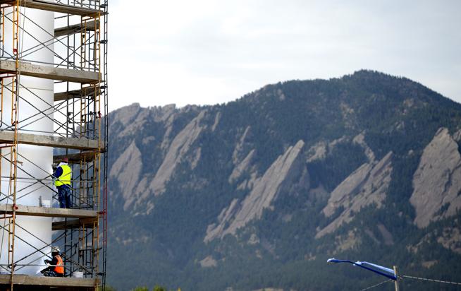 Construction crews work on the Boulder Junction development at 30th Street and Pearl Parkway, this building would be one exception of the ordinance. (Photo: Mark Leffingwell / Daily Camera)