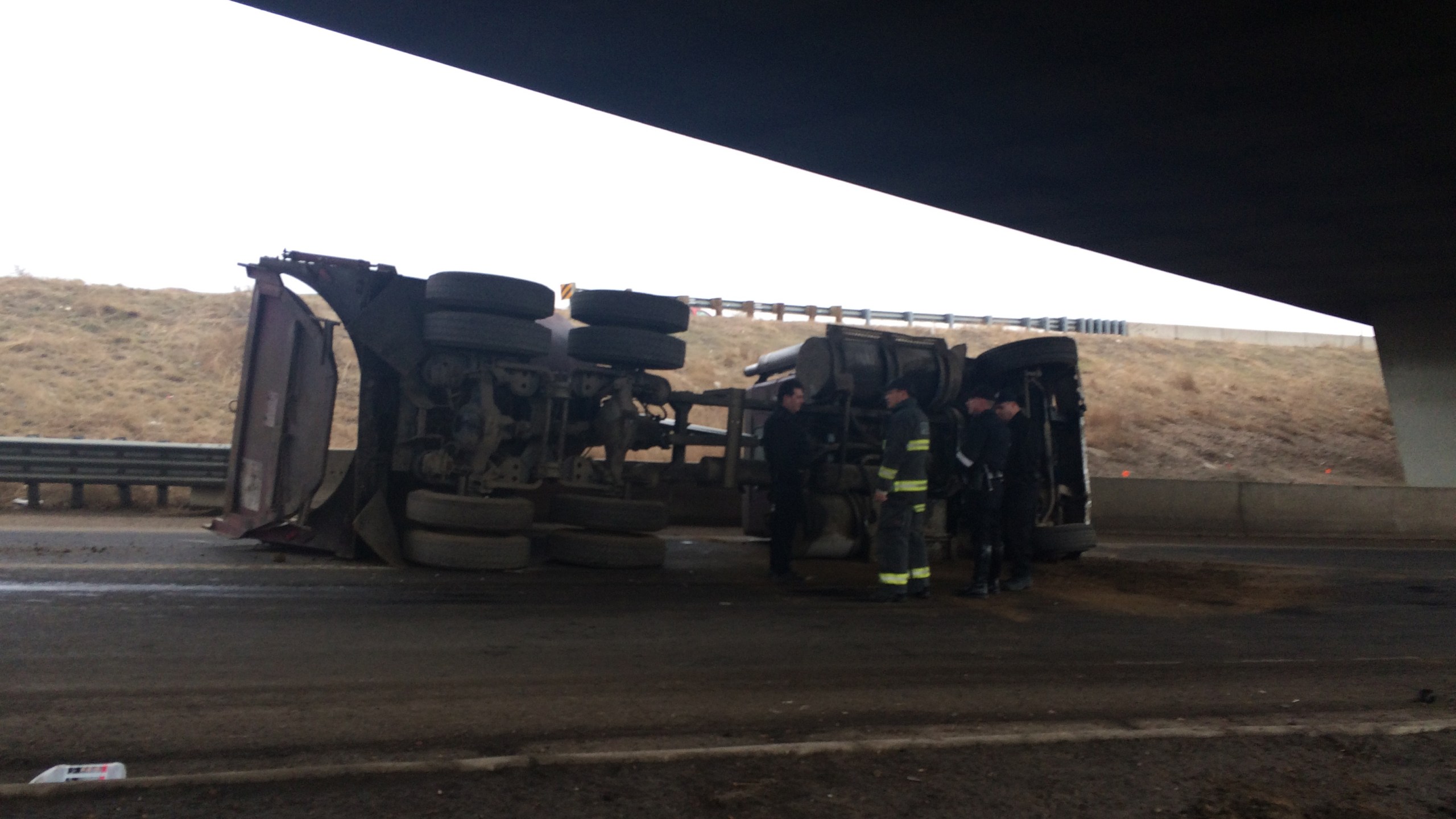 Truck rollover closes 8th Ave. off-ramp from northbound I-25. January 13, 2015