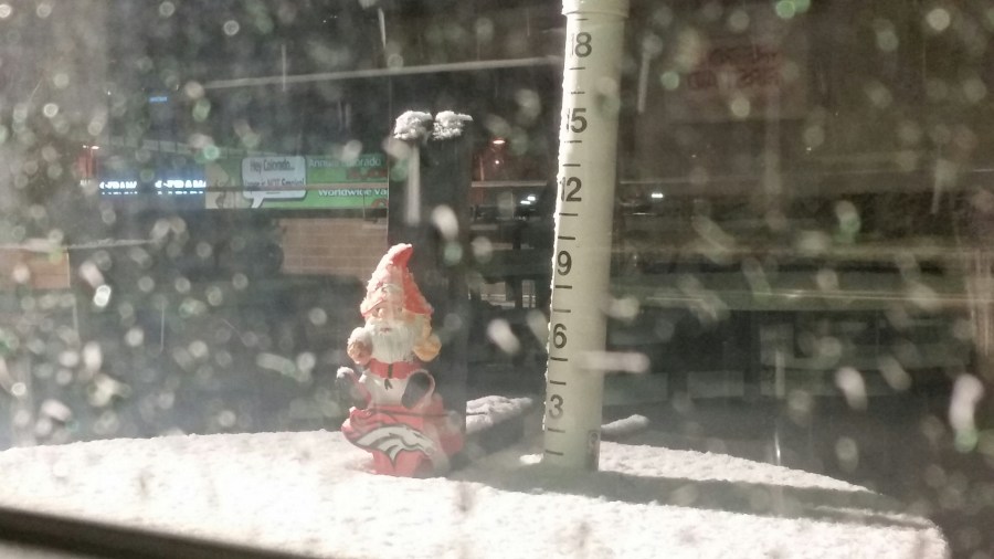 Broncos gnome next to the FOX31 Denver snow stick Friday, Feb. 20