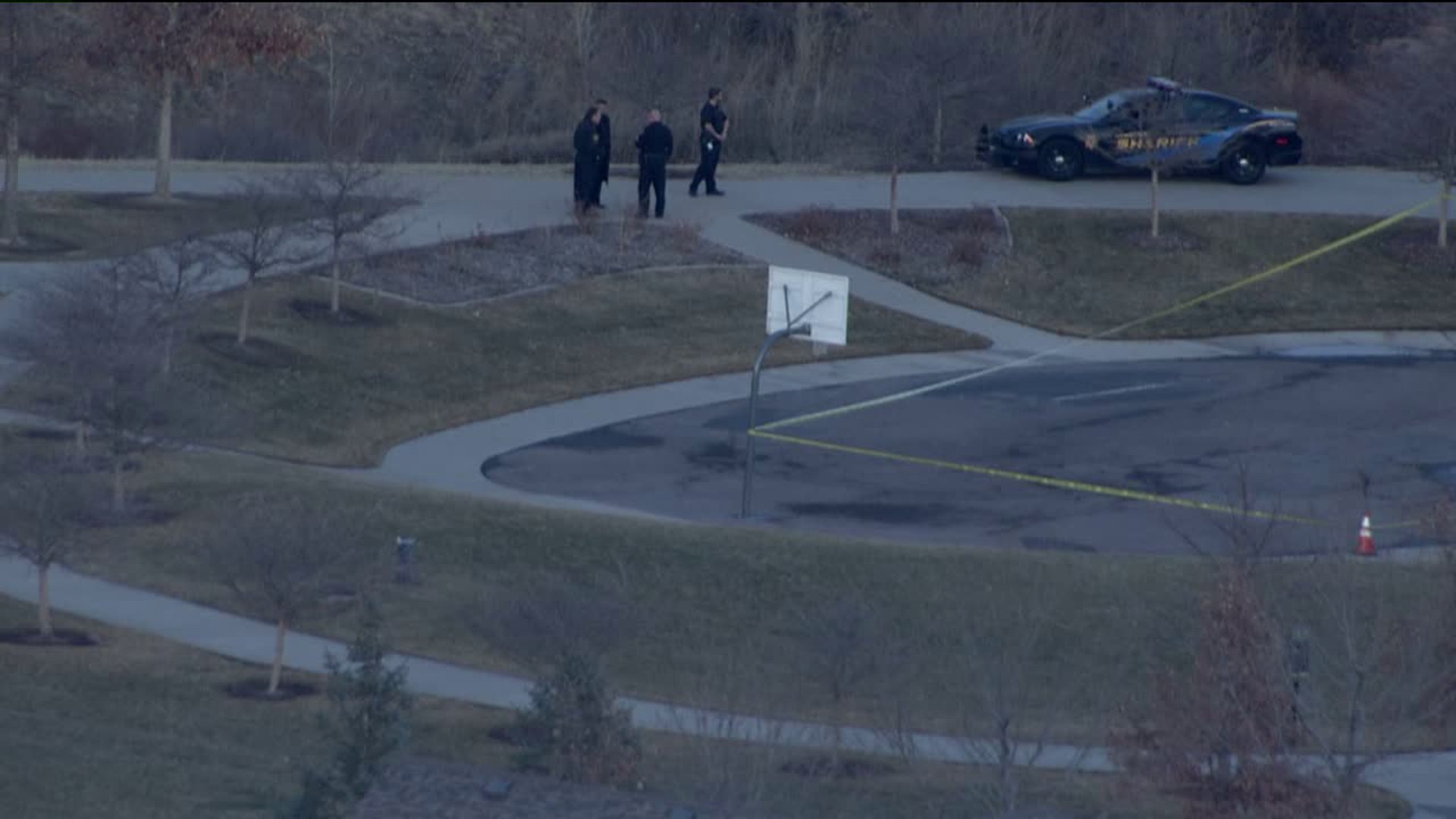 Investigators in Dad Clark Park in Highlands Ranch, Colo