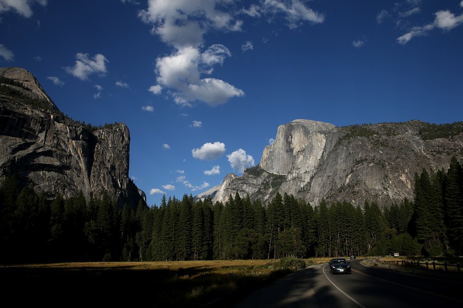 A view of Half Dome and the Yosemite Valley on August 28, 2013 in Yosemite Nationall Park, California. As the Rim Fire continues to burn on the western edge of Yosemite National Park, the valley floor of the park remains open. The Rim Fire has charred more than 190,000 acres of forest and is currently 30 percent contained. (Photo by Justin Sullivan/Getty Images)