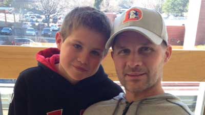 Denver Police Officer John Adsit with his son, Ronald