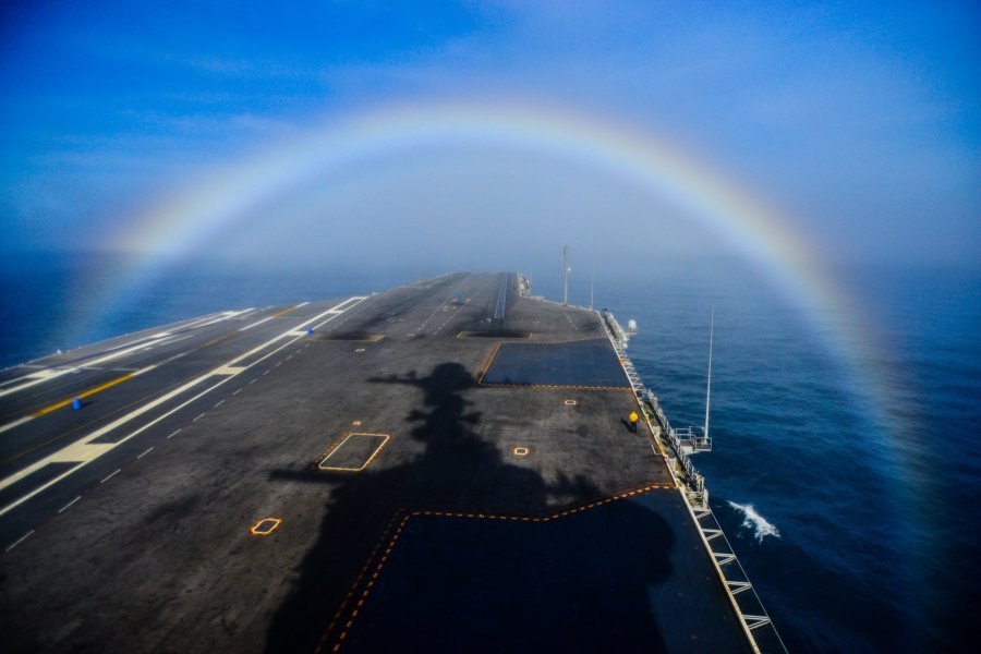 Navy photographer Ignacio Perez captured a shot of the USS John C. Stennis 1,100-foot-long warship as it was crusing in the Pacific Ocean steaming through a rainbow on Feb. 3, 2015