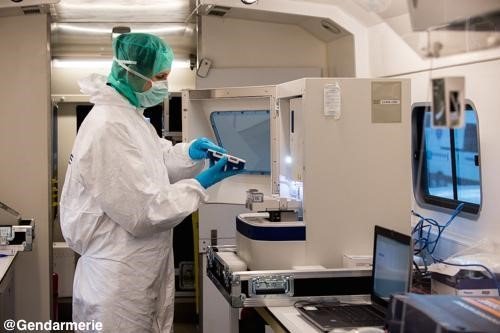 A French police mobile lab starts the testing process of human remains from the Germanwings flight 9525 crash site on March 26, 2015.