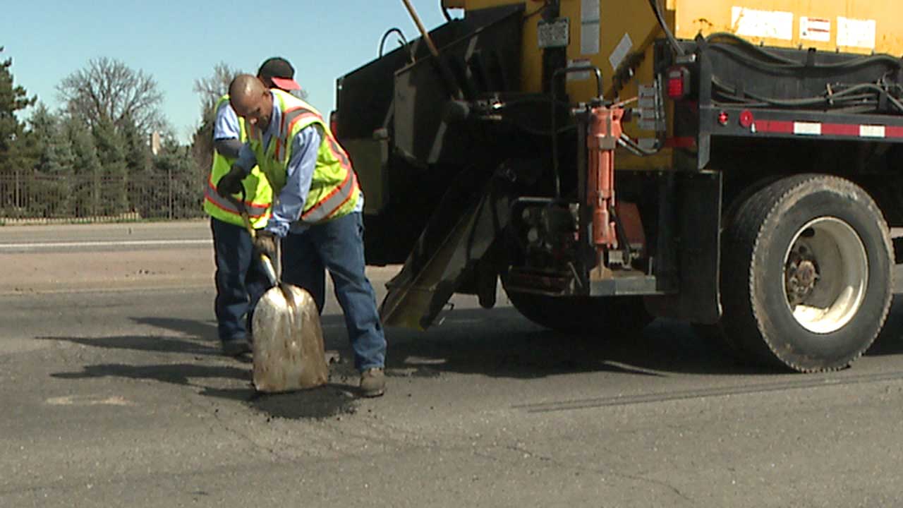 Filling potholes in Aurora, Colo