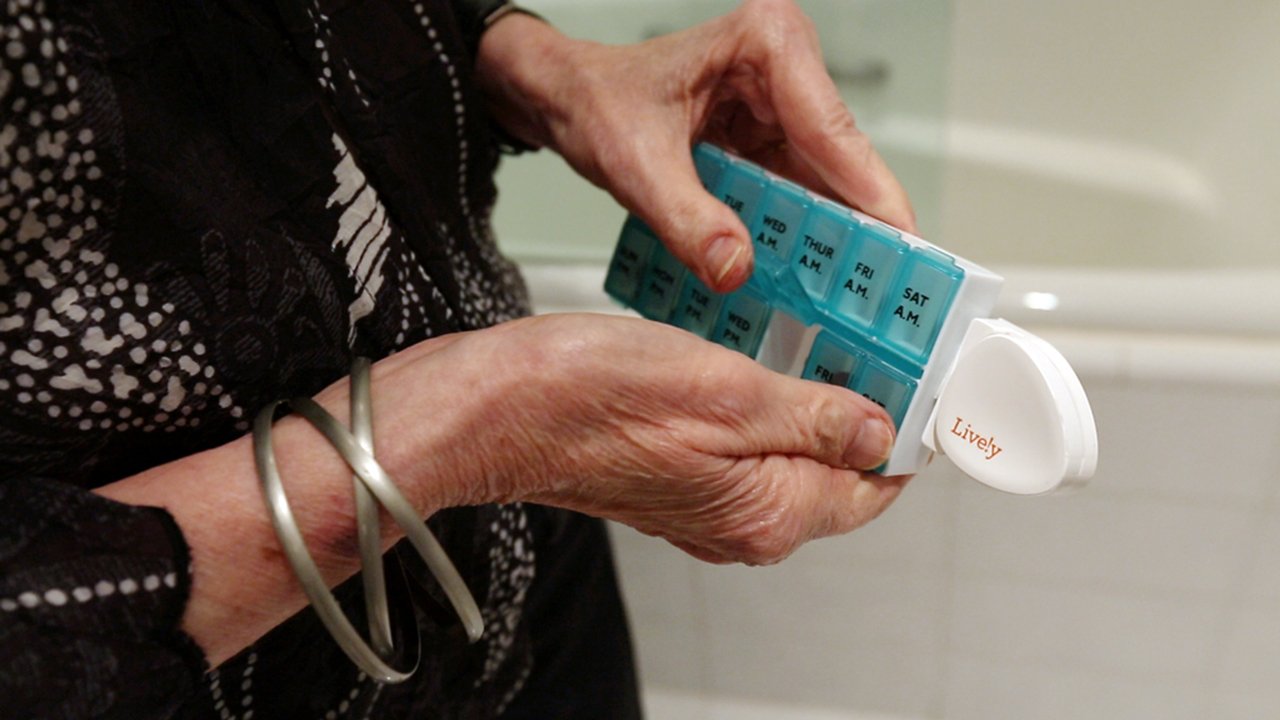 Technology like this pillbox sensor from Lively can help caretakers monitor people with Alzheimer's and dementia from afar.