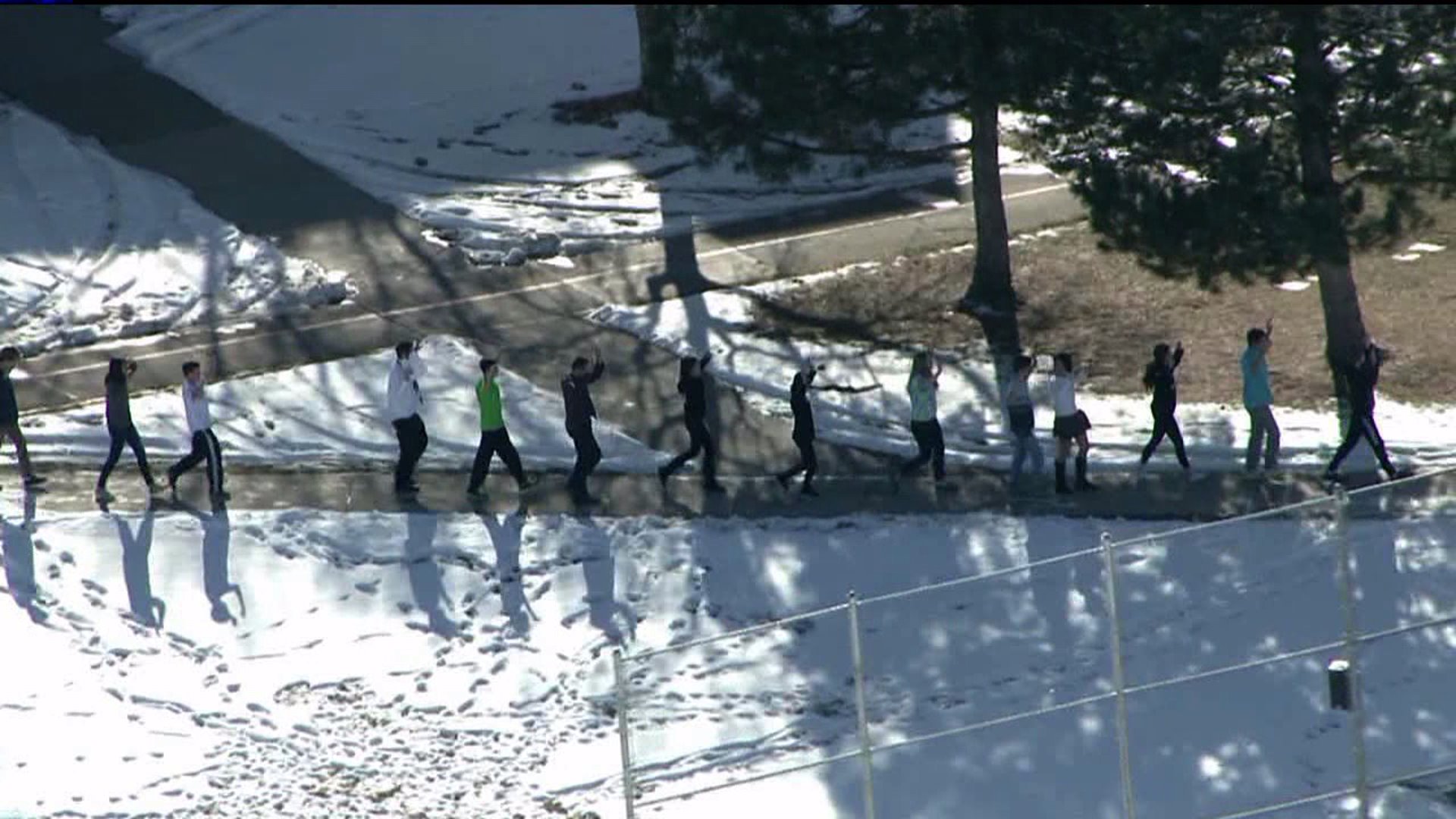 Students exit Arapahoe H.S. after shooting in Dec. 2013