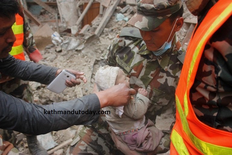 A 4-month-old baby was rescued from a destroyed building in the town of Bhaktapur at least 22 hours after the quake struck, the newspaper Kathmandu Today reported. (Photo: CNN)