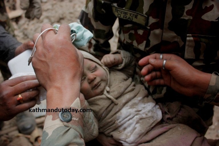 A 4-month-old baby was rescued from a destroyed building in the town of Bhaktapur at least 22 hours after the quake struck, the newspaper Kathmandu Today reported. (Photo: CNN)