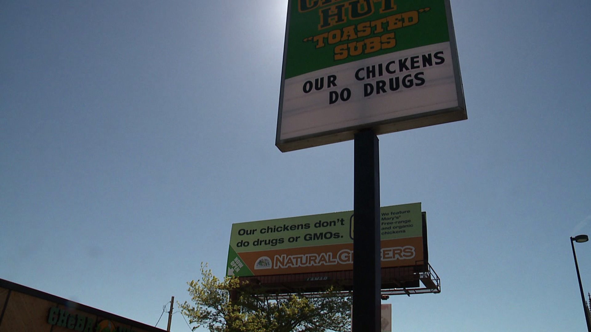 Dueling signs between Denver businesses