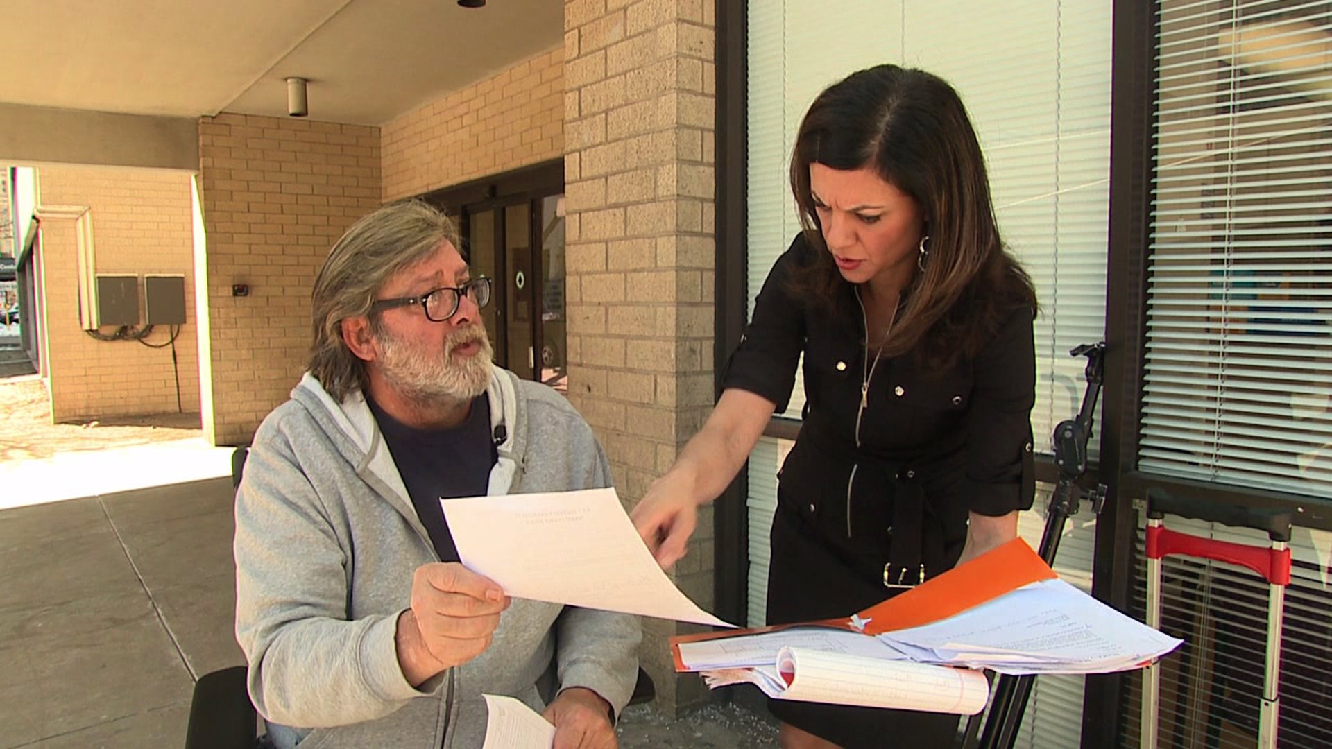 Apartment resident Robert Hart and Investigative Reporter Heidi Hemmat