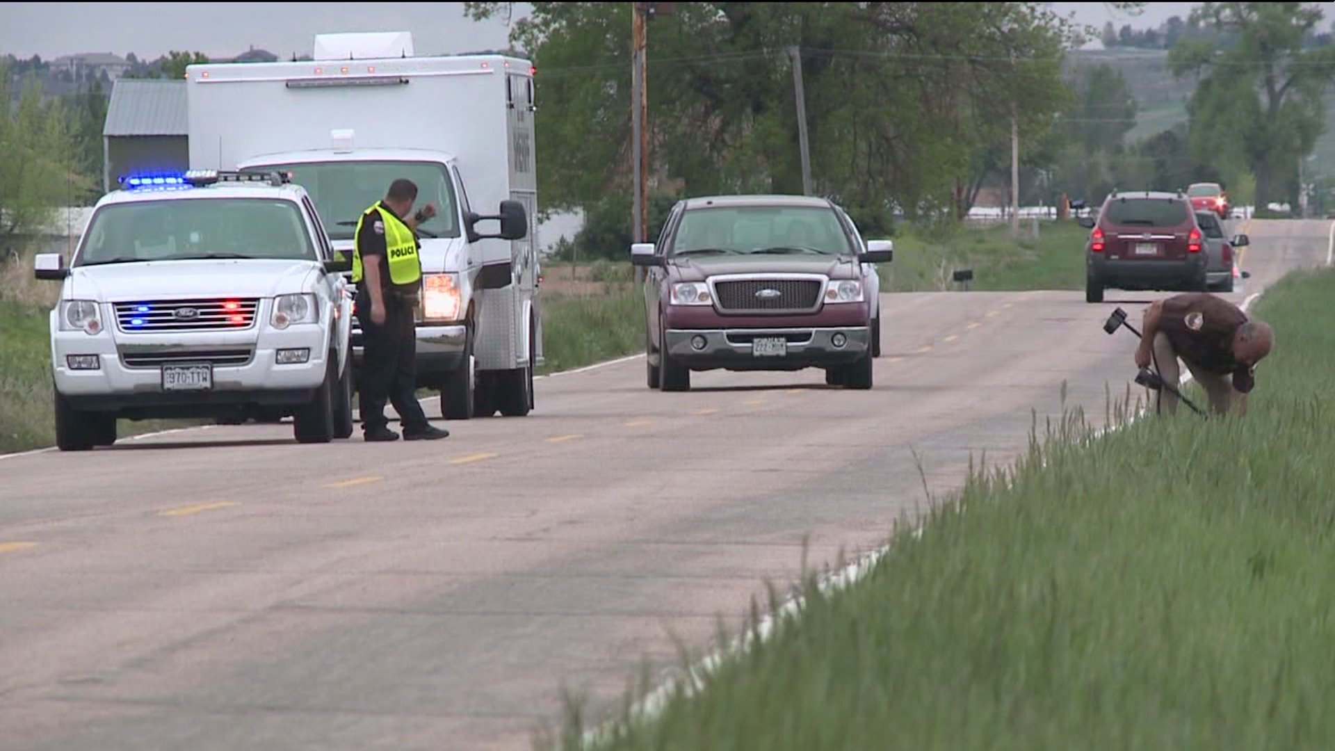 Investigators at scene where bicyclist was shot and killed east of Windsor, Colo