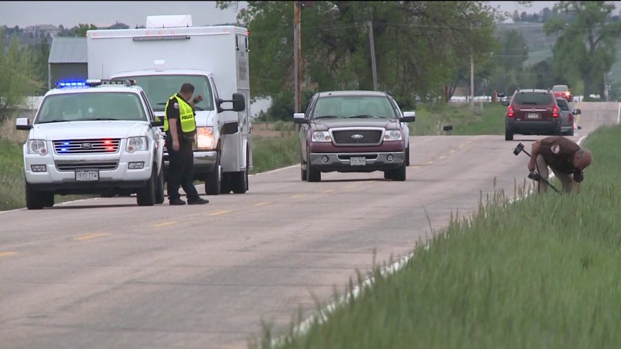 Investigators at scene where bicyclist was shot and killed east of Windsor, Colo