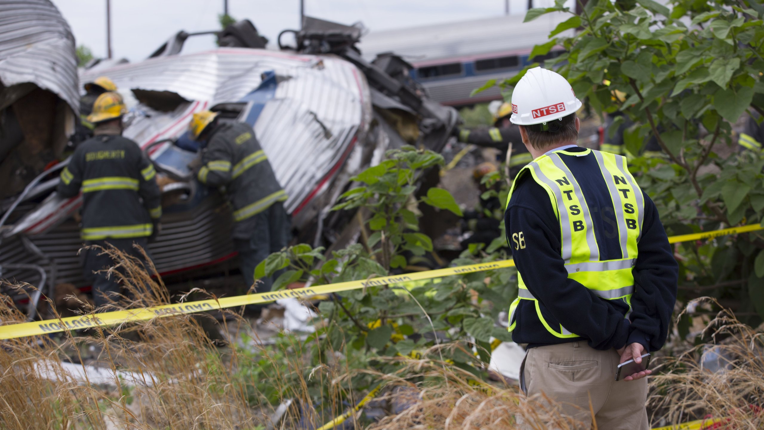 NTSB Member Robert Sumwalt examines the scene of the Amtrak Train 188 Derailment in Philadelphia, Pennsylvania on May 13, 2015. Courtesy: NTSB