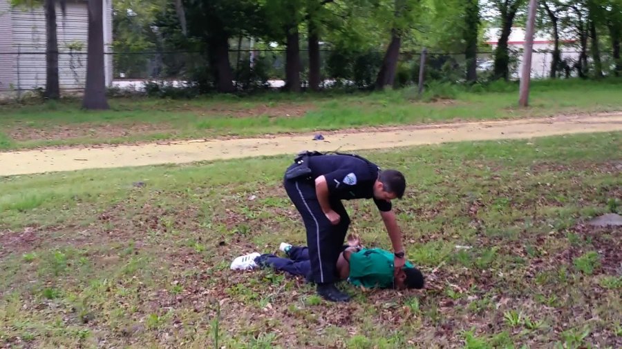 This still, released by the family of Walter Scott, appears to show North Charleston, South Carolina police officer Michael Slager shooting Scott in the back as he ran away from the officer. The incident took place Saturday, April 4, 2015. (Photo: CNN)