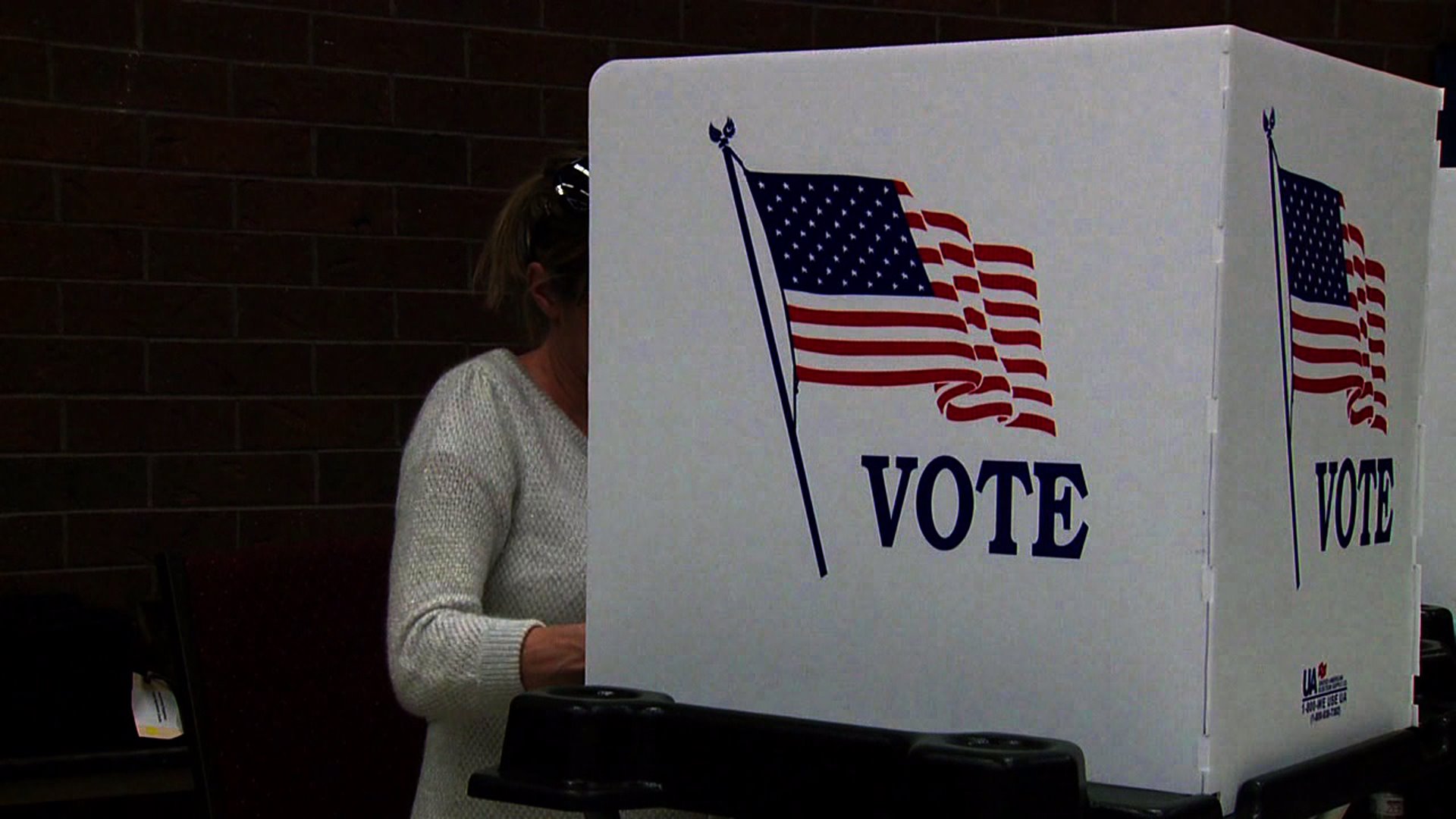 A voter casts a ballot.