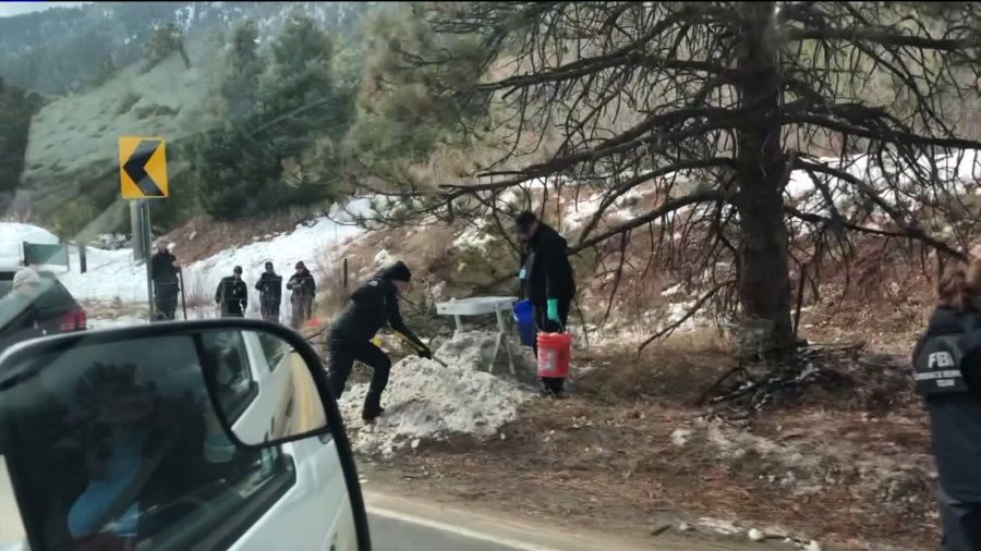 Crews involved in the search for Gannon Stauch along South Perry Park Road in southern Douglas County on Feb. 17, 2020.