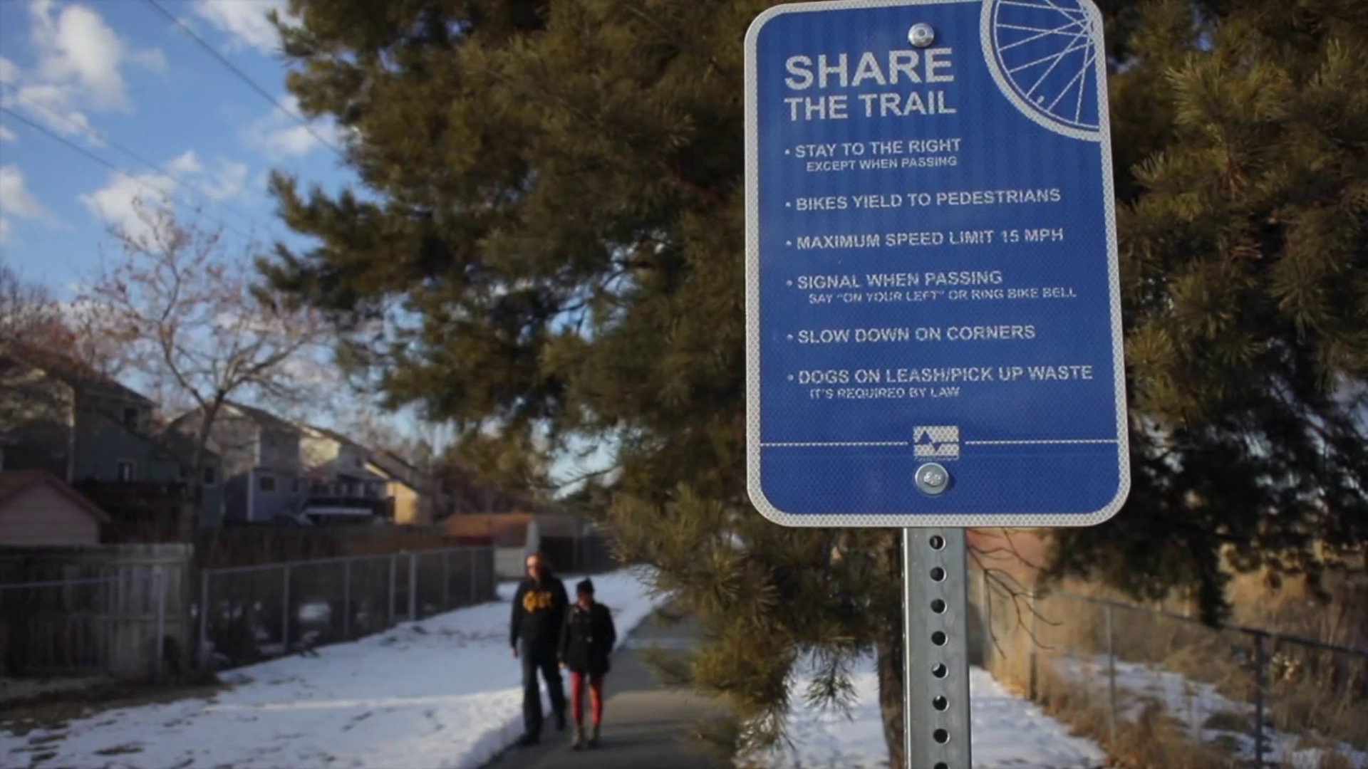 Two people walking a trail in Loveland, Colo. on Feb. 17, 2020.