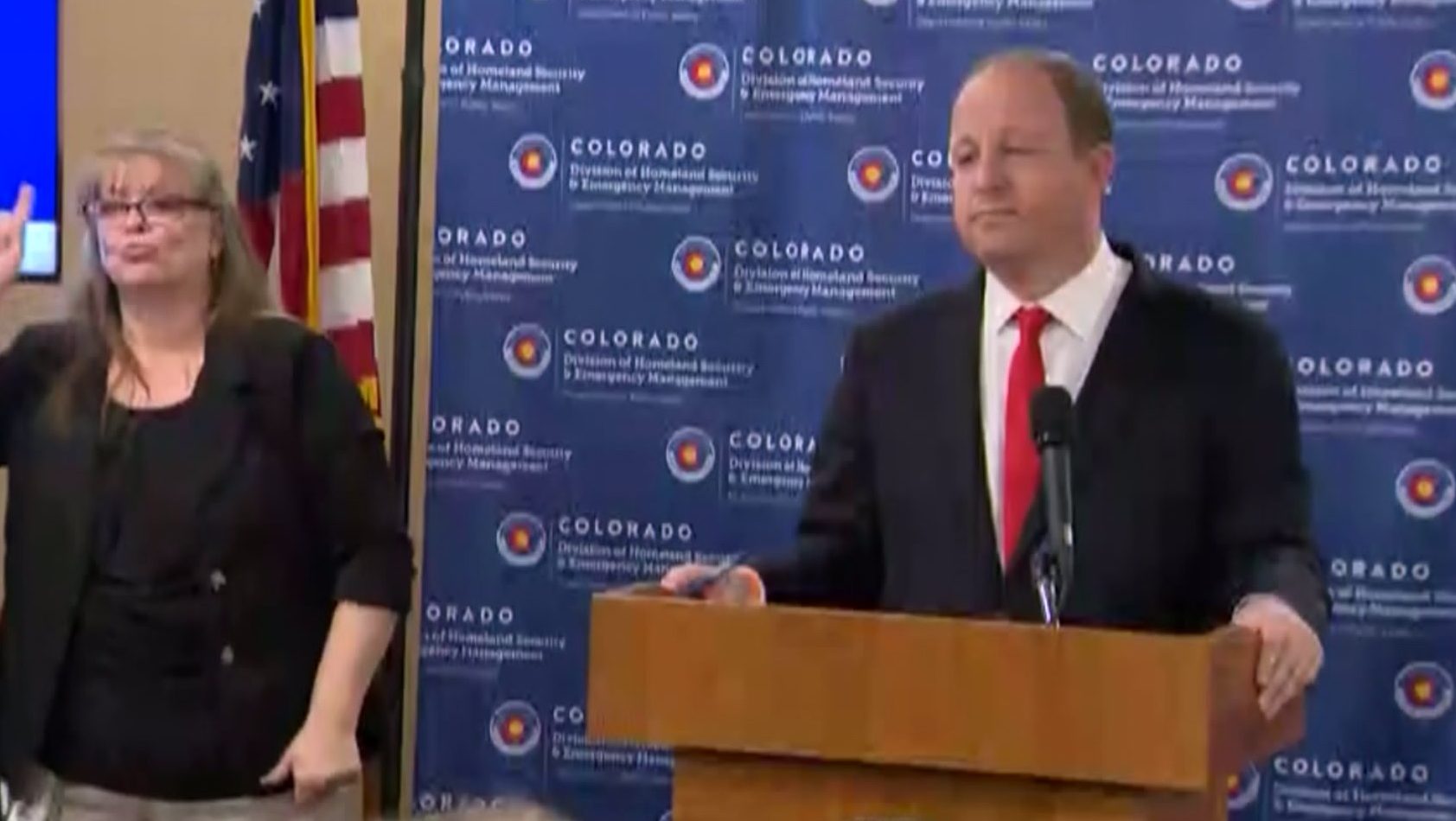 Colorado Gov. Jared Polis holds a COVID-19 news conference on March 27, 2020.