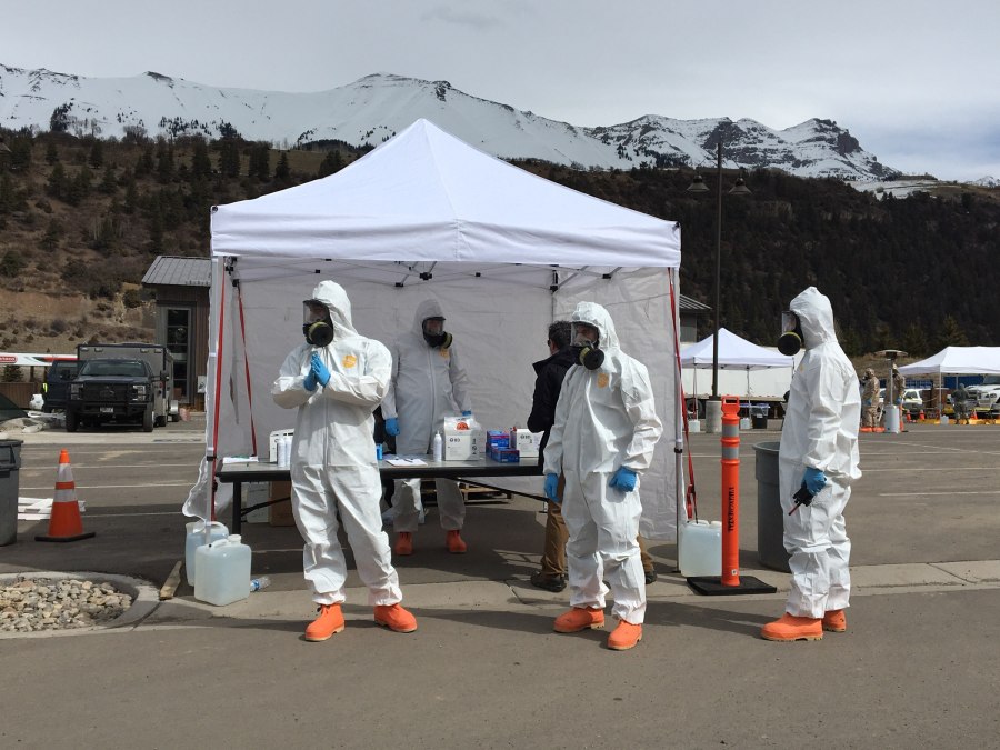 Members of the Colorado National Guard assist San Miguel County and the Colorado Department of Public Health & Environment with a COVID-19 drive-up testing station in Telluride, Colorado, March 17, 2020.