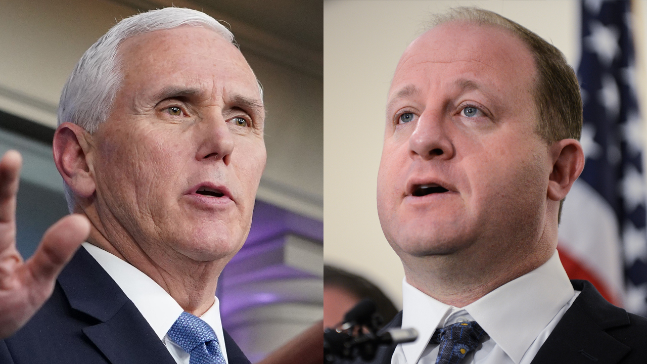 Vice President Mike Pence and Colorado Gov. Jared Polis