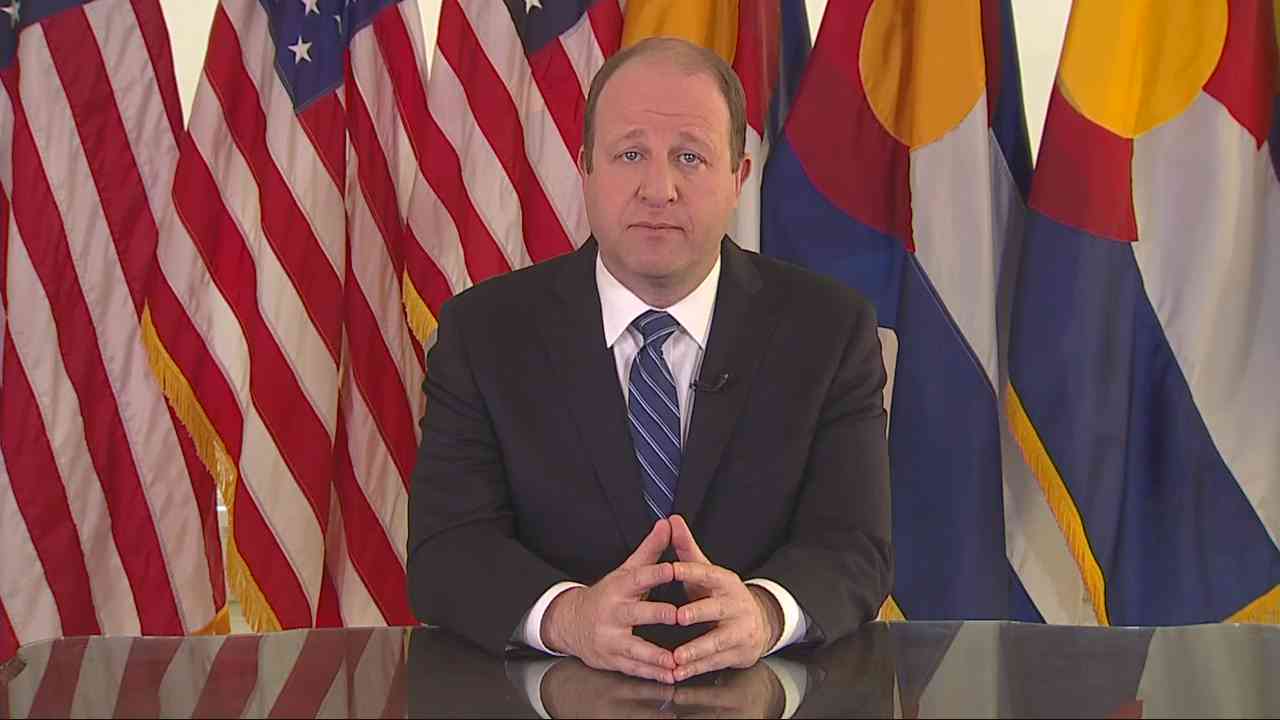 Colorado Gov Jared Polis delivers a statewide address on the coronavirus on April 6, 2020.