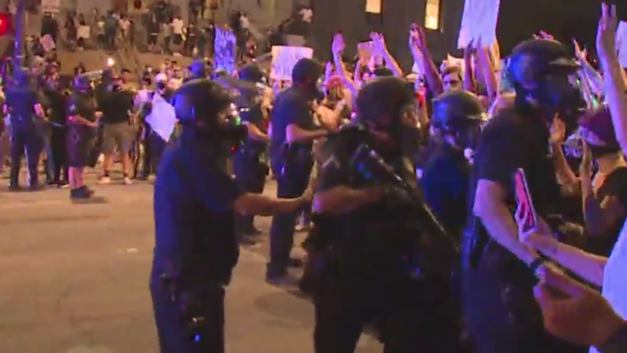 Police in front of a crowd in Denver on May 28, 2020 protesting the in-custody death of George Floyd in Minneapolis.