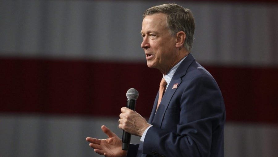 Former Colorado Gov. John Hickenlooper speaks on stage during a forum on gun safety at the Iowa Events Center on August 10, 2019 in Des Moines, Iowa.