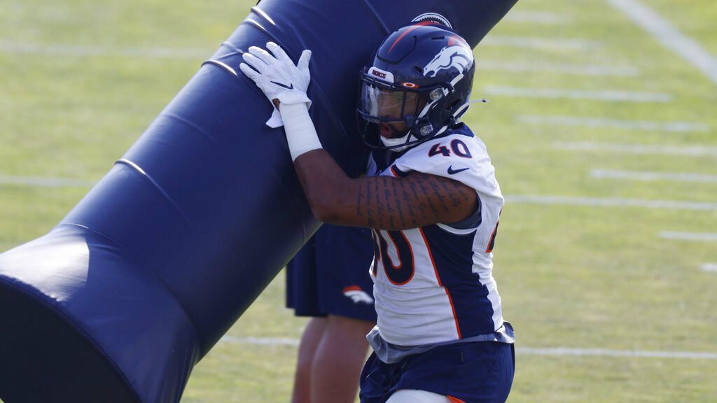 Denver Broncos linebacker Justin Strnad takes part in drills during an NFL football practice at the team's headquarters Wednesday, Aug. 19, 2020, in Englewood, Colo.