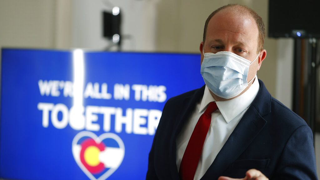 Colorado Gov. Jared Polis at a news conference coronavirus Thursday, July 9, 2020, in Denver.