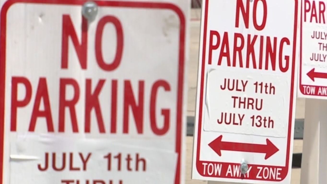 3 no parking signs dated July 11-13 with tow-away zone notice